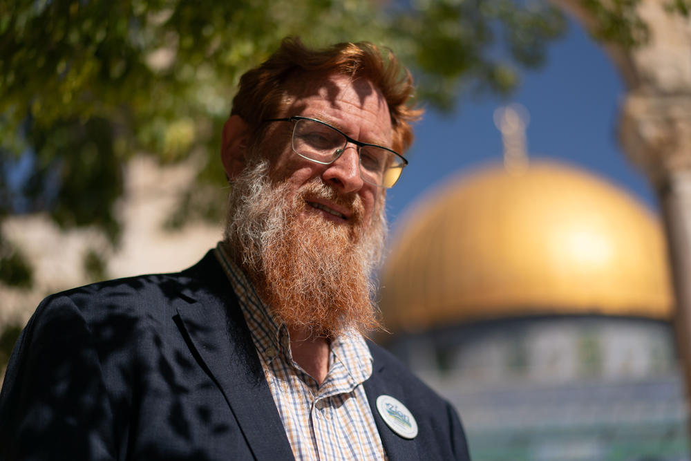 Yehuda Glick, a New York-born Israeli activist in the movement for Jewish prayer rights at the Temple Mount, stands in front of the Dome of the Rock on March 21.