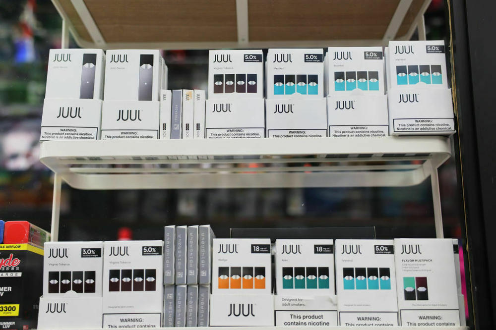Juul packages are seen on a shop shelf on December 07, 2022.