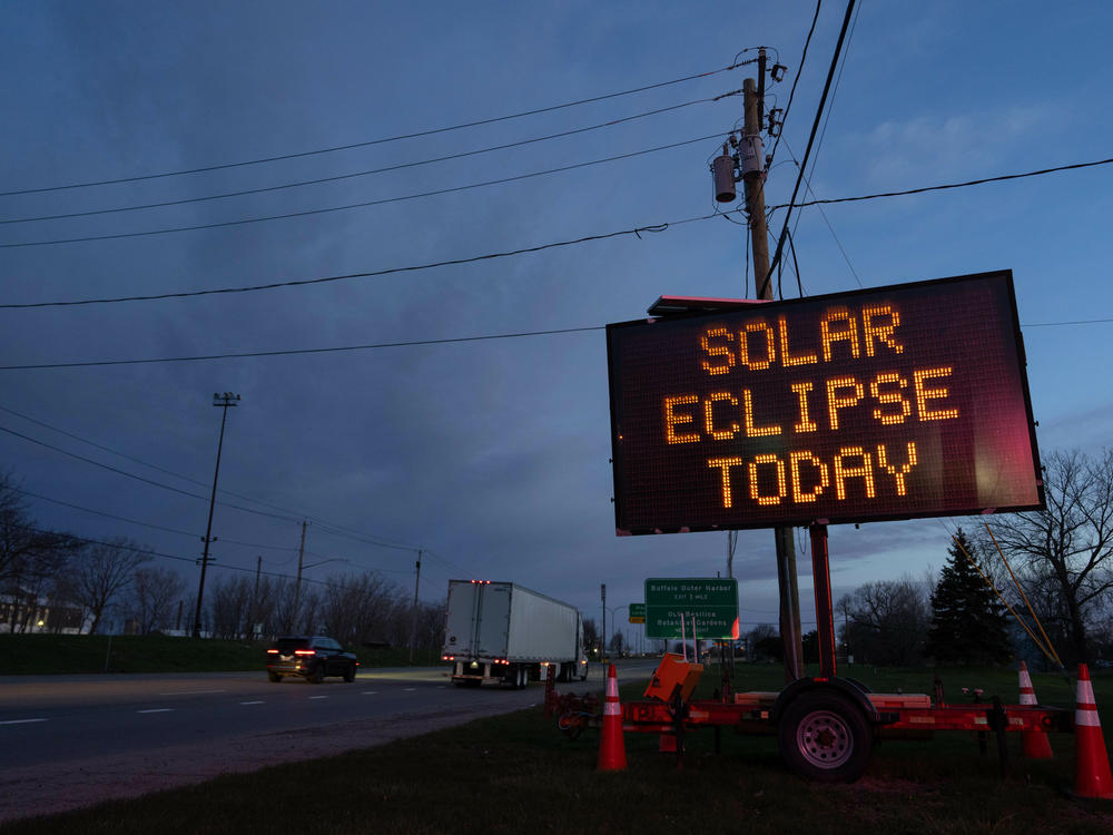 A road sign in Lackawanna, N.Y., advertises the upcoming eclipse on Monday.