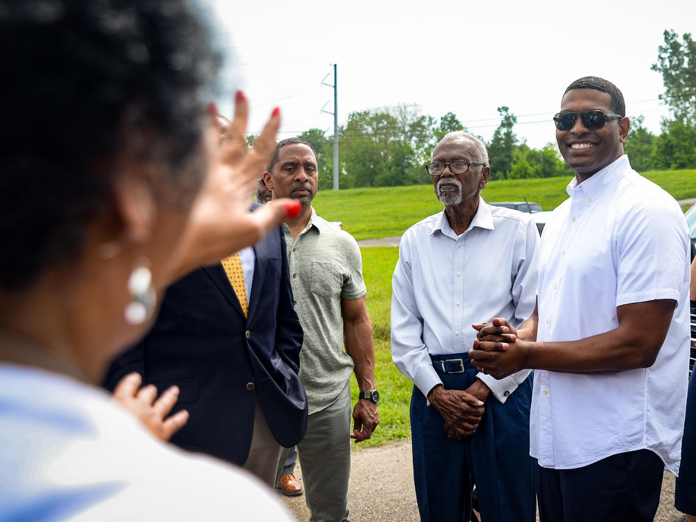 Environmental Protection Agency Director Michael Regan smiles at Louisiana environmental justice advocates before announcing plans for new regulations on the chemical manufacturing industry during a visit to LaPlace, Louisiana last year.