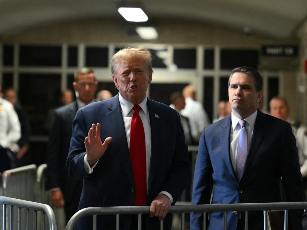 Former President Donald Trump speaks to the press at Manhattan criminal court after a hearing on Feb. 15.