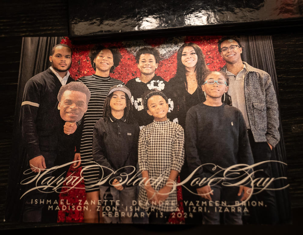 A family portrait honors the life of the late Zaire Kelly.