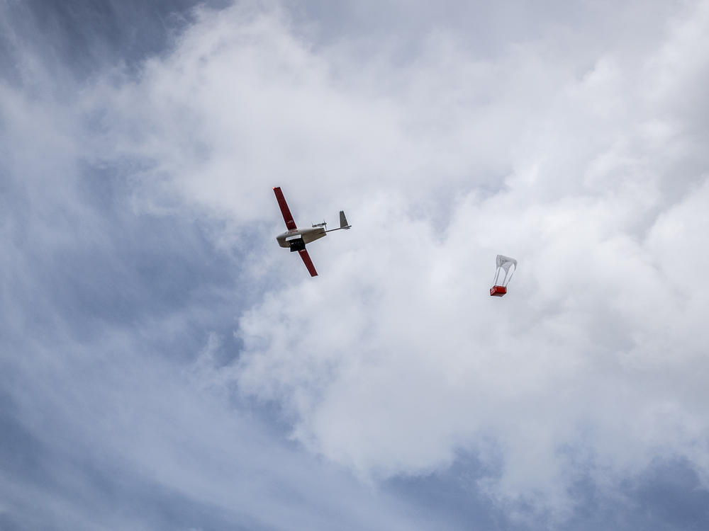 A Zipline drone drops off a blood bag at a hospital near Kigali, Rwanda this month. The drone medical delivery service first developed in Rwanda and Ghana, now primarily operates in the U.S.