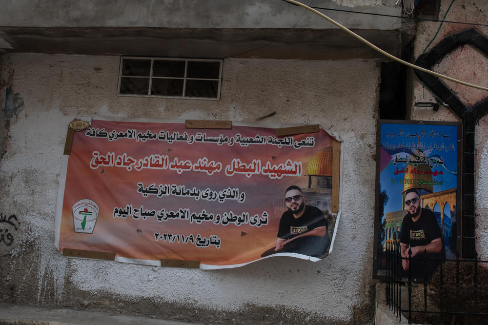 A sign in the Al-Amari camp in Ramallah commemorates victims of a Nov. 9 raid on the camp.