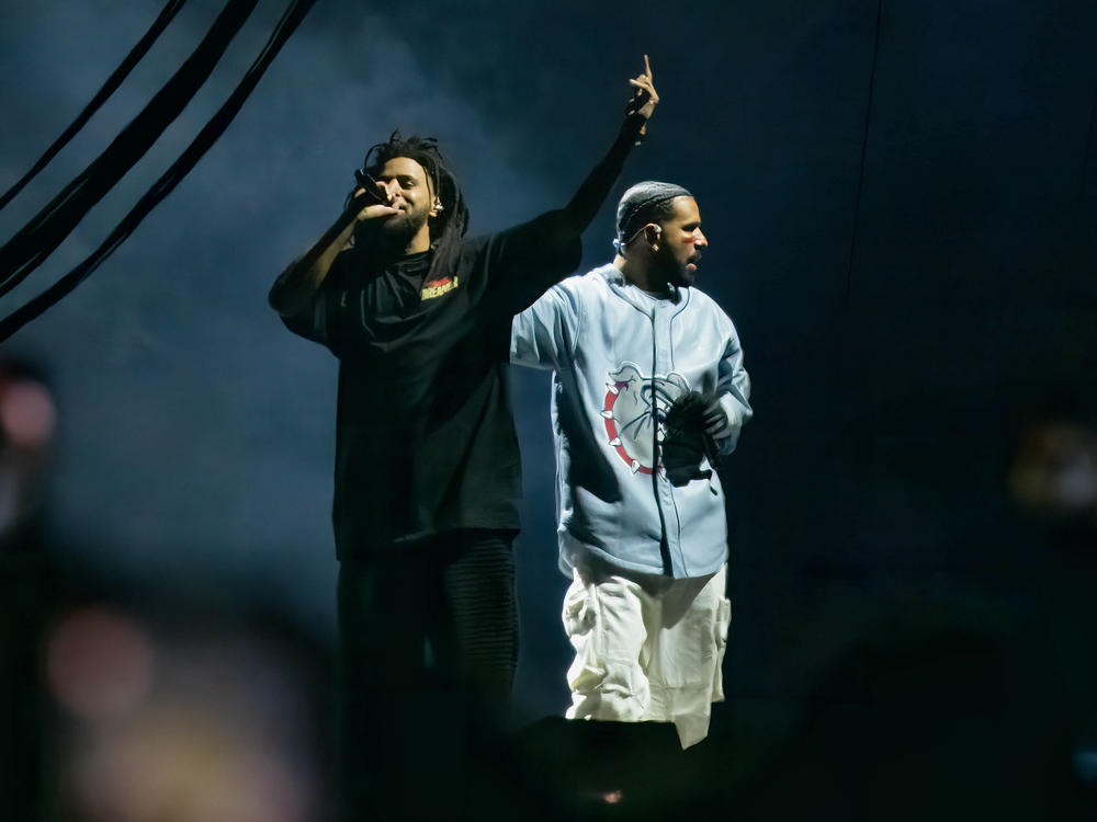 J. Cole and Drake perform during the 2023 edition of Cole's Dreamville festival in Raleigh, N.C., last April. Their collaborative track 
