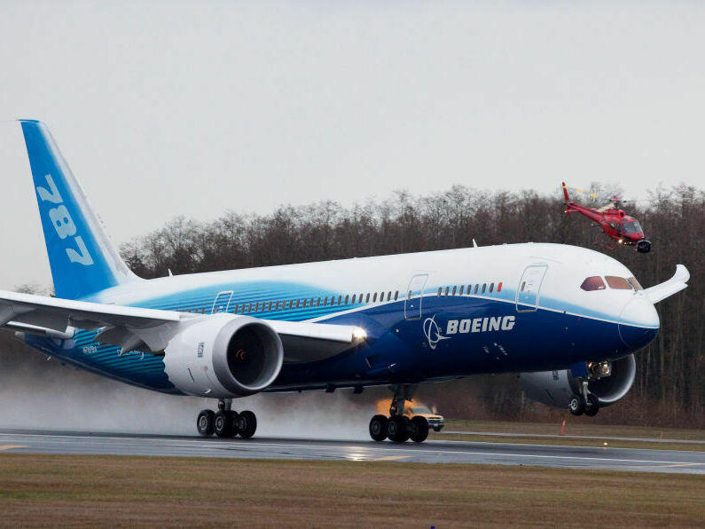 A Boeing 787 Dreamliner accelerates down the runway during its first flight in December, 2009 in Everett, Wash.