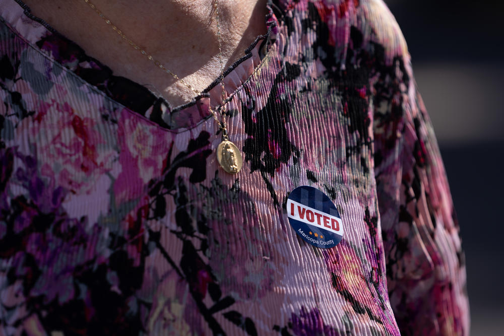 People vote on presidential preference election day in Mesa, Ariz., at a Church of Jesus Christ of Latter-day Saints.