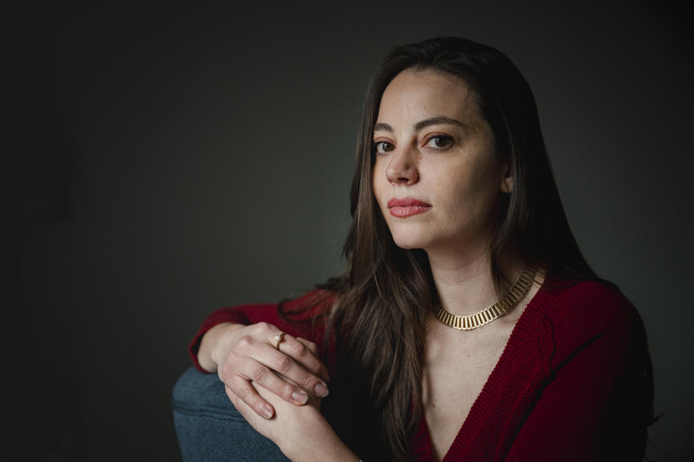 Natasha Danielá de Lima McGlynn, executive director of Anti-Violence Partnership of Philadelphia, sits at the main office in Philadelphia on Tuesday, March 26, 2024.