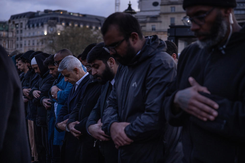 Muslims including London Mayor Sadiq Khan pray as they gather in Trafalgar Square for an open iftar event on April 20, 2023, in London.