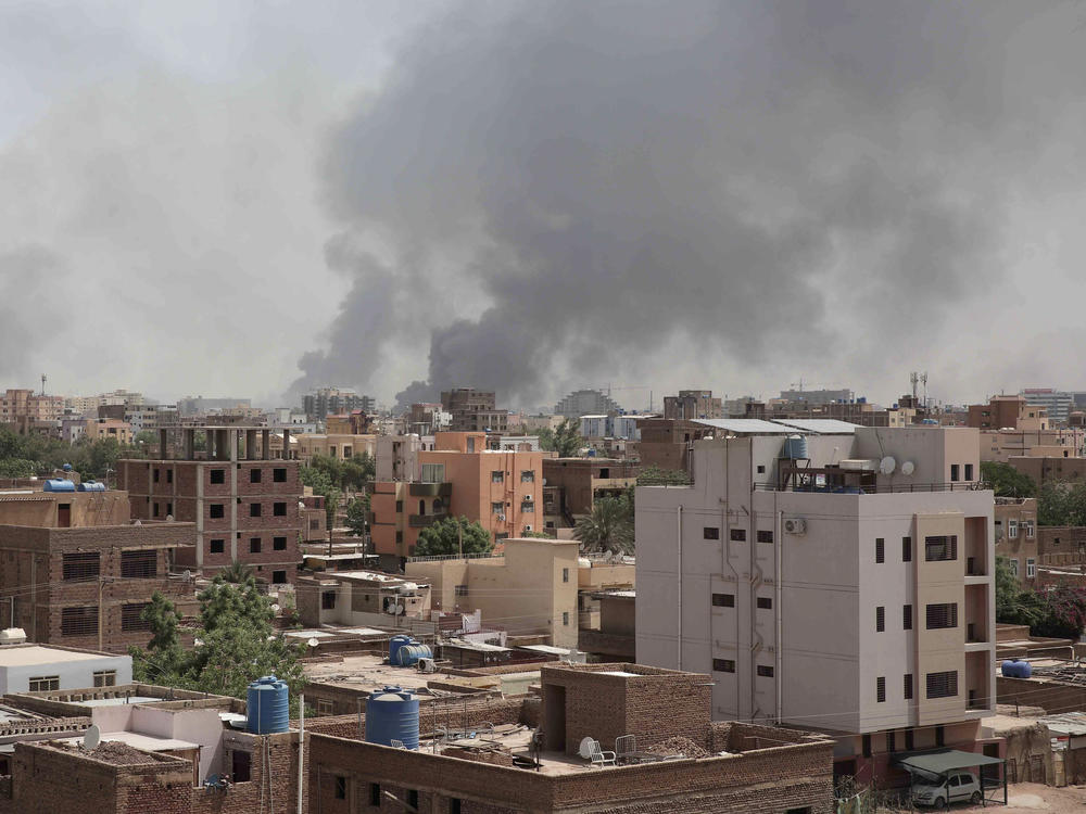 Smoke is seen rising from Khartoum's skyline, Sudan, Sunday, April 16, 2023. The Sudanese military and a powerful paramilitary group have been battling for control of the chaos-stricken nation.