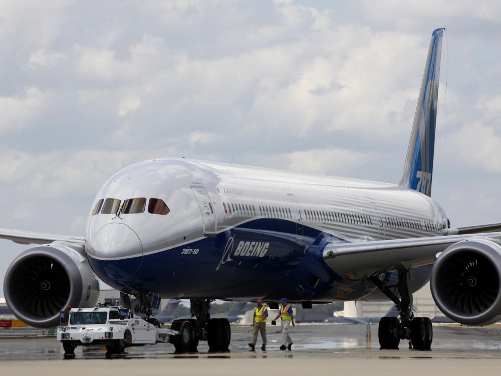 Boeing employees walk the new Boeing 787-10 Dreamliner down towards the delivery ramp area at the company's facility after conducting its first test flight at Charleston International Airport in 2017. A Senate subcommittee has opened an investigation into the safety of Boeing jetliners, intensifying safety concerns about the company's aircraft.