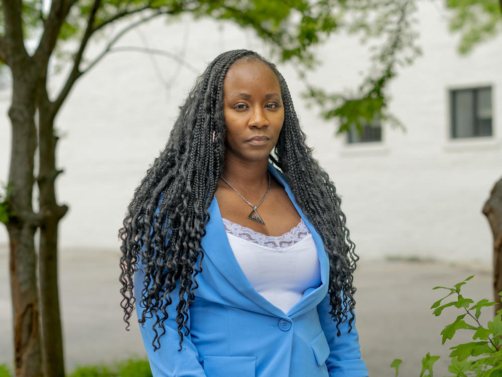 Shalela Dowdy, a plaintiff in a lawsuit challenging Alabama's congressional districts, poses for a portrait on Government Street in Mobile, Ala., on April 1.