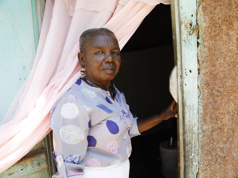Moncher Metina outside her house in Limonade, Haiti, on March 17, 2024.