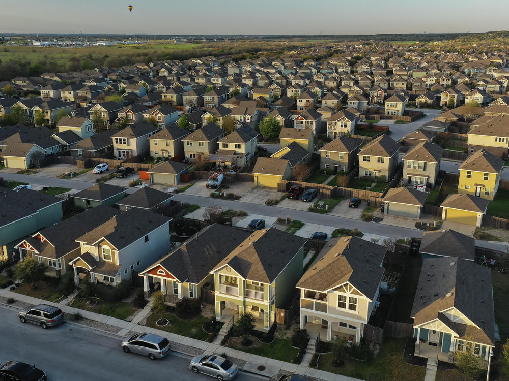 Some baby boomers find that when they want to downsize, there are no smaller options in their neighborhoods. Single-family homes are seen in a neighborhood in San Marcos, Texas, last month.