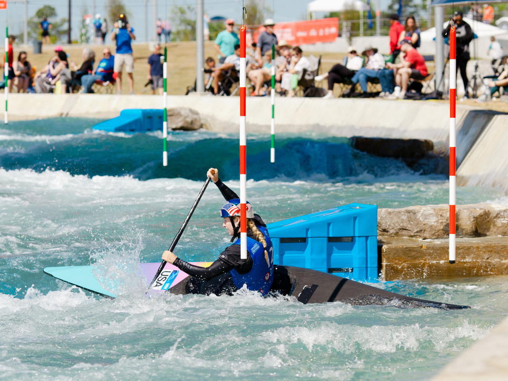 Evy Leibfarth navigates a slalom course at Montgomery Whitewater Park in Alabama. She won an Olympic trial there and punched her ticket to the Paris games this summer.