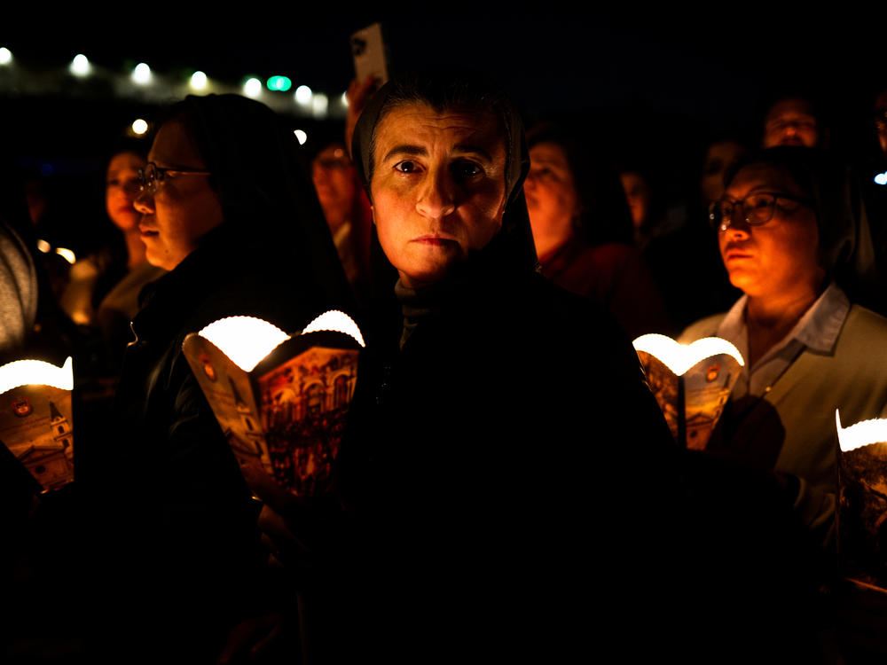 Christians hold a candlelight procession in Jerusalem outside the Church of All Nations, also known as the Church of Gethsemane, on March 28. This year, Easter, Purim and Ramadan overlapped for the first time in three decades.