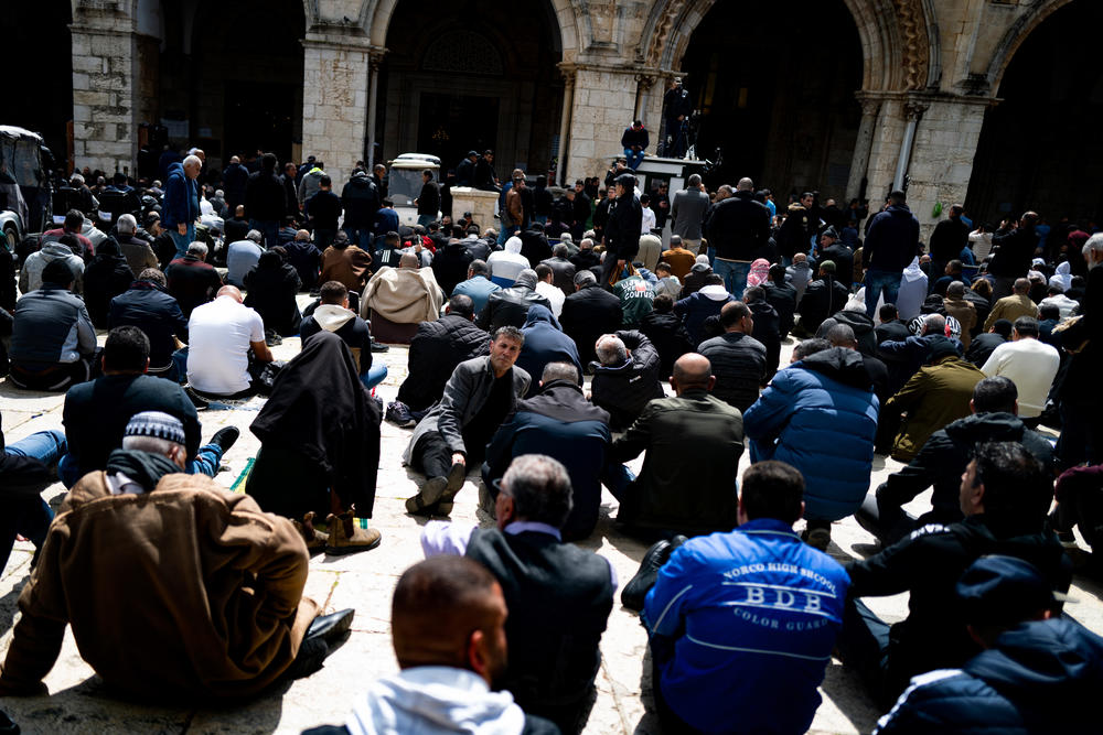 Men prepare for Friday prayers at the Al-Aqsa compound during Ramadan in Jerusalem. It is a sacred site in Islam, where the Prophet Muhammad is believed to have ascended into paradise. Despite severe restrictions on Palestinians entering from the Israeli-occupied West Bank, more than 1.5 million worshipers visited the Al-Aqsa compound during the holy month of Ramadan, Jerusalem police said.