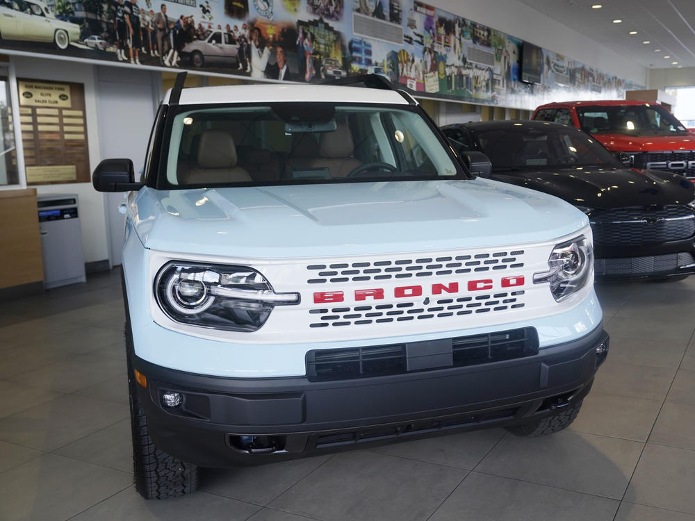 A Ford Bronco is displayed at a Ford dealership in Hialeah, Fla., on Jan. 23, 2023. Ford is recalling more than 456,000 Bronco Sport and Maverick vehicles due to a battery detection issue that can result in loss of drive power.