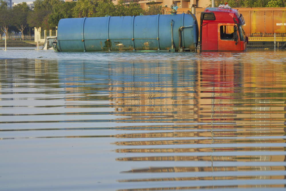A tanker truck sits abandoned in floodwater in Dubai, United Arab Emirates, Thursday. The United Arab Emirates attempted to dry out Thursday from the heaviest rain the desert nation has ever recorded, a deluge that flooded out Dubai International Airport and disrupted flights through the world's busiest airfield for international travel.