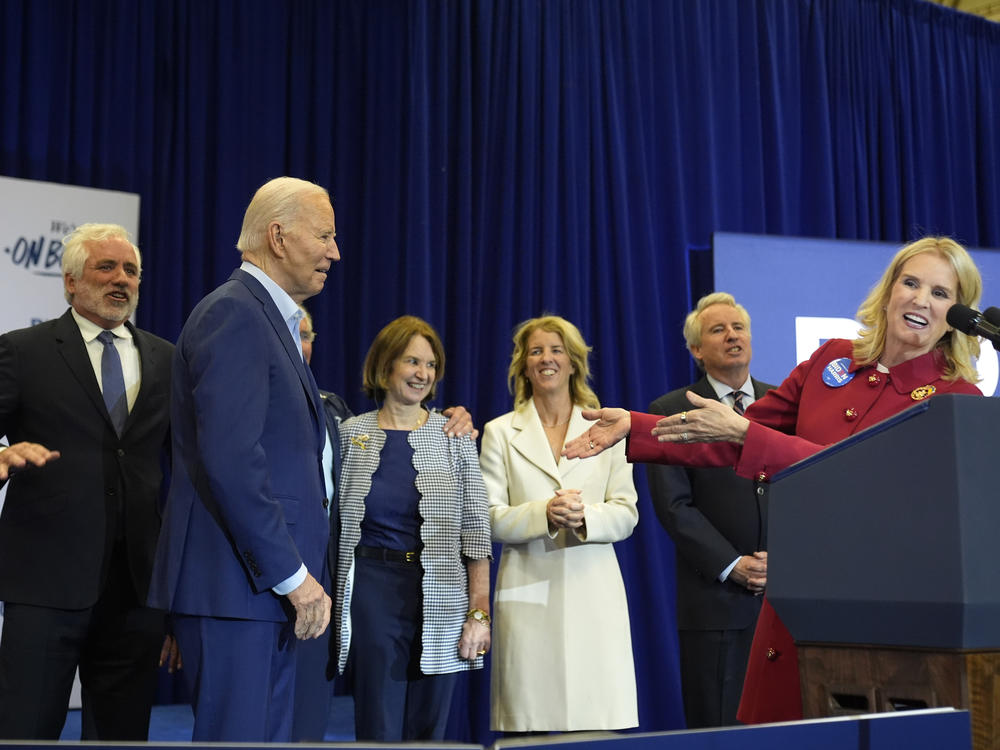 Kerry Kennedy, right, introduces President Biden at a campaign event on April 18 in Philadelphia where she and members of her family endorsed the president's reelection bid.