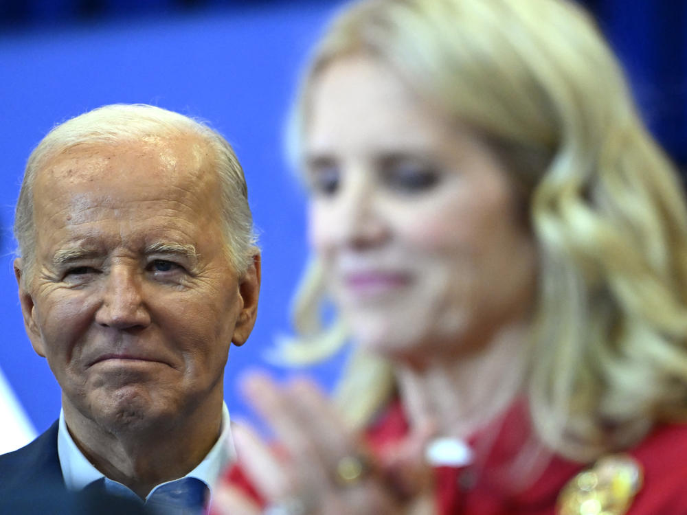 President Biden listens to Kerry Kennedy at a Philadelphia event where the Kennedy family endorsed his campaign.