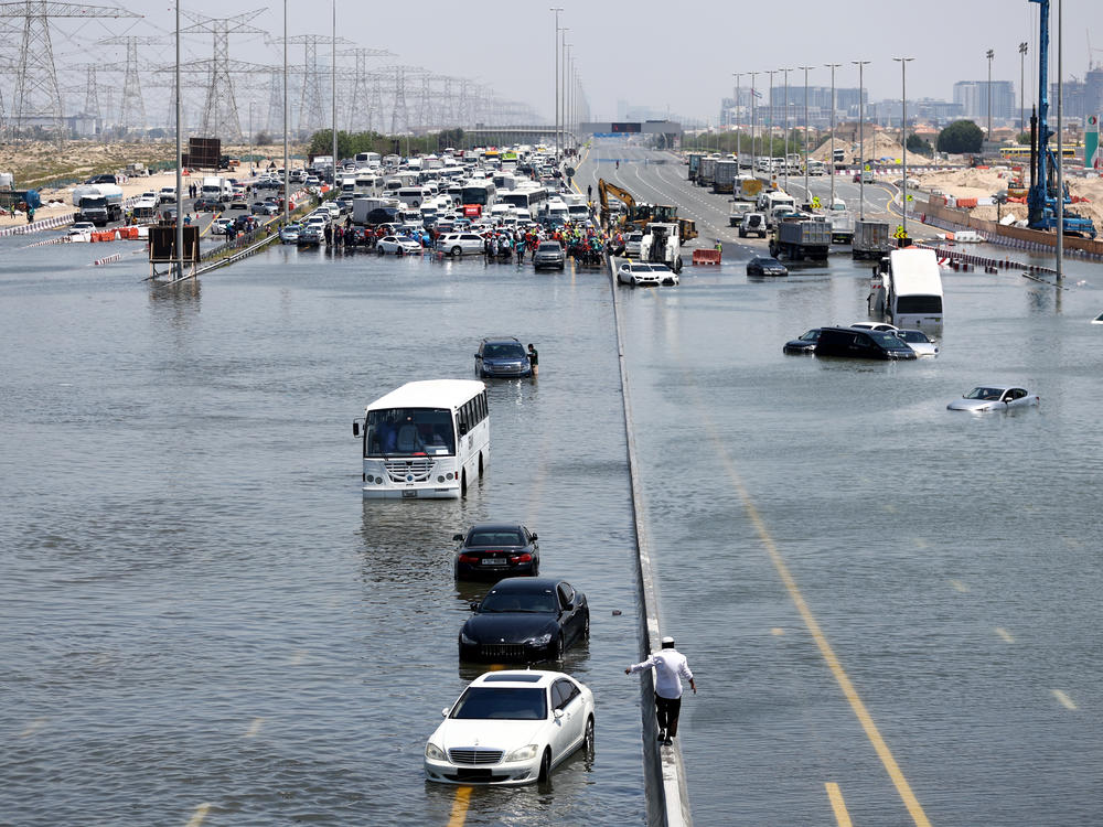 Atypically heavy rains in the United Arab Emirates on Monday and Tuesday caused flooding, flight cancellations and school closures. Vehicles were abandoned on highways like this one in Dubai.