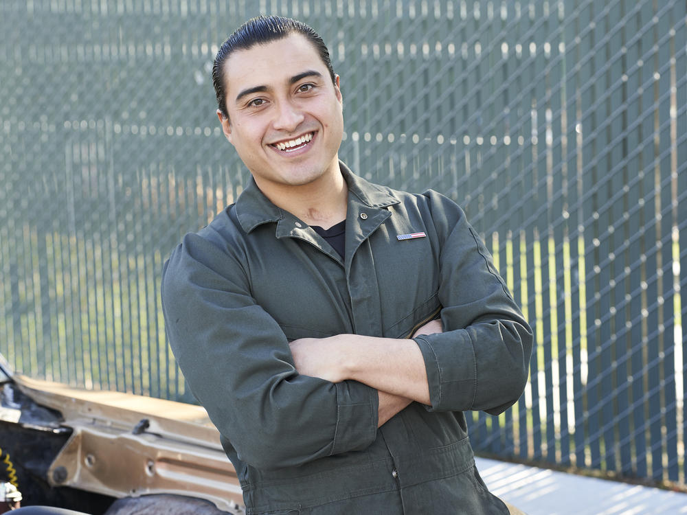 Diego Aguilar works at a trade center at East Bay Municipal Utility District in Oakland, Calif.