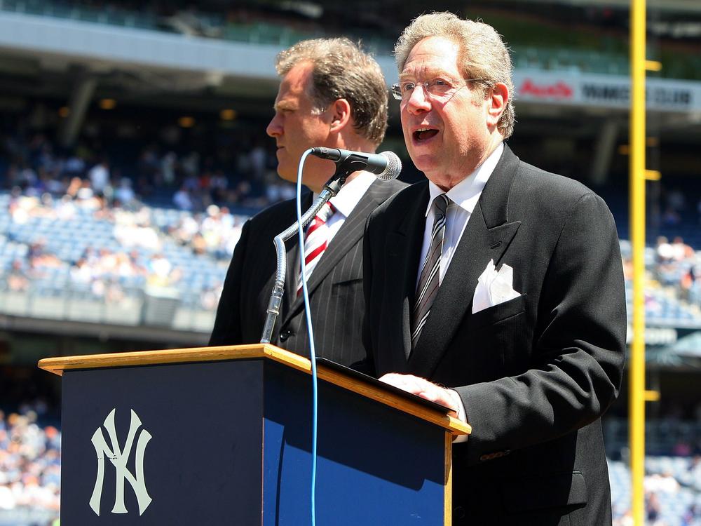 New York Yankees radio broadcaster John Sterling speaks during the teams 63rd Old Timers Day before the game against the Detroit Tigers on July 19, 2009, at Yankee Stadium in the Bronx borough of New York City.