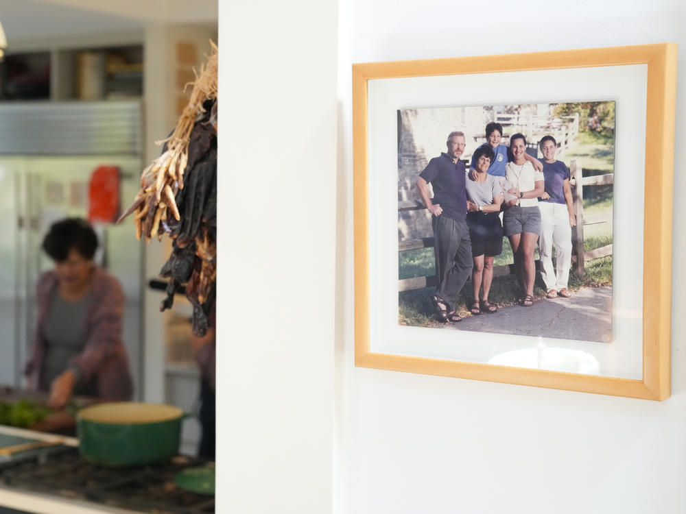 A photo of her family hangs in the living rooms as cookbook author Joan Nathan prepares matzo ball soup in the kitchen of her home in Washington, D.C.