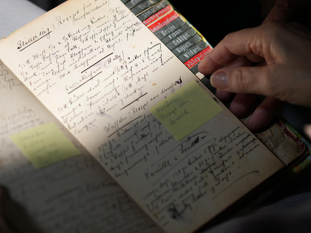 Cookbook author Joan Nathan looks through old family recipe books.