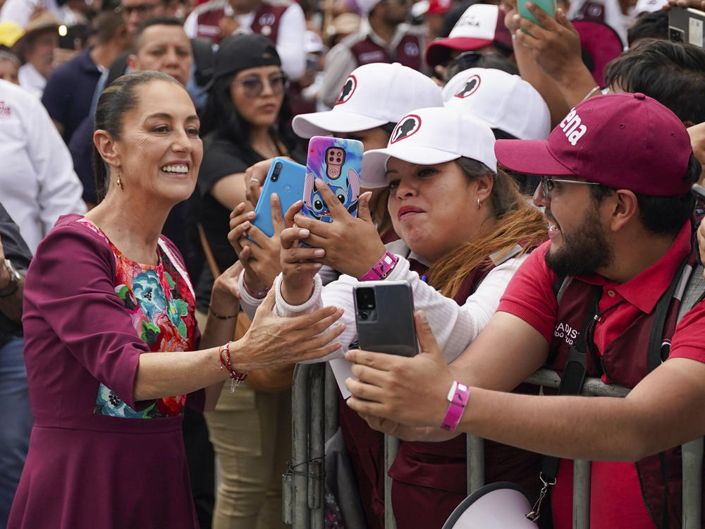 Mexican presidential candidate Claudia Sheinbaum greets supporters upon her arrival to her opening campaign rally at the Zócalo plaza in Mexico City, on March 1.