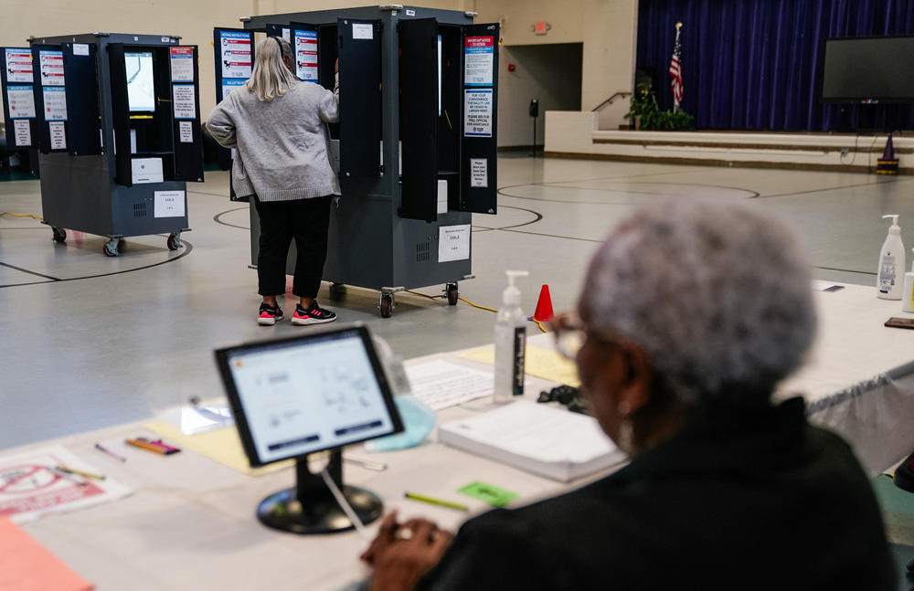 A voter casts a primary ballot at a polling place in Atlanta on March 12.