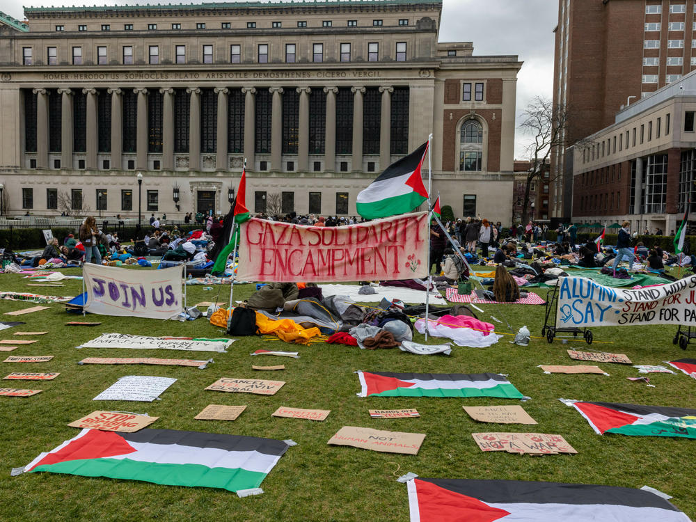 Students occupy the campus Columbia University on Friday, calling for the school to divest from companies with ties to Israel.