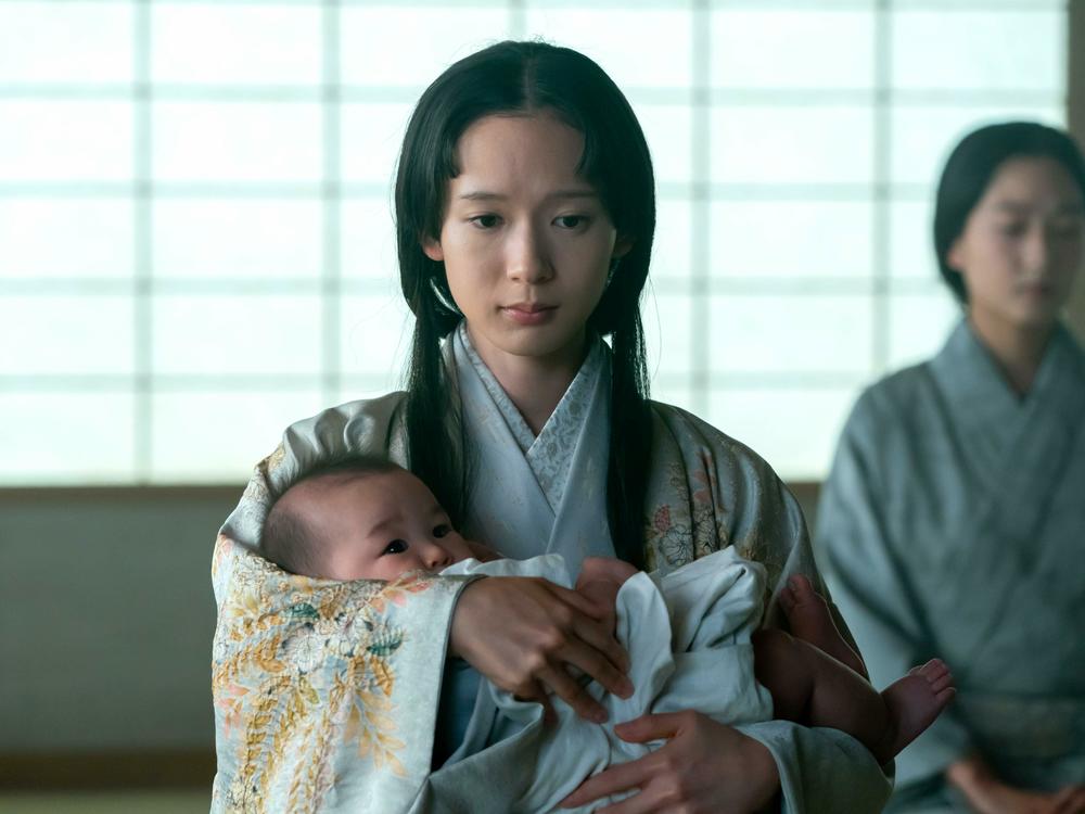 Usami Fuji (Moeka Hoshi) is assigned by Toranaga to be John Blackthorne's consort. She is the daughter of a revered warlord, Hiromatsu.
