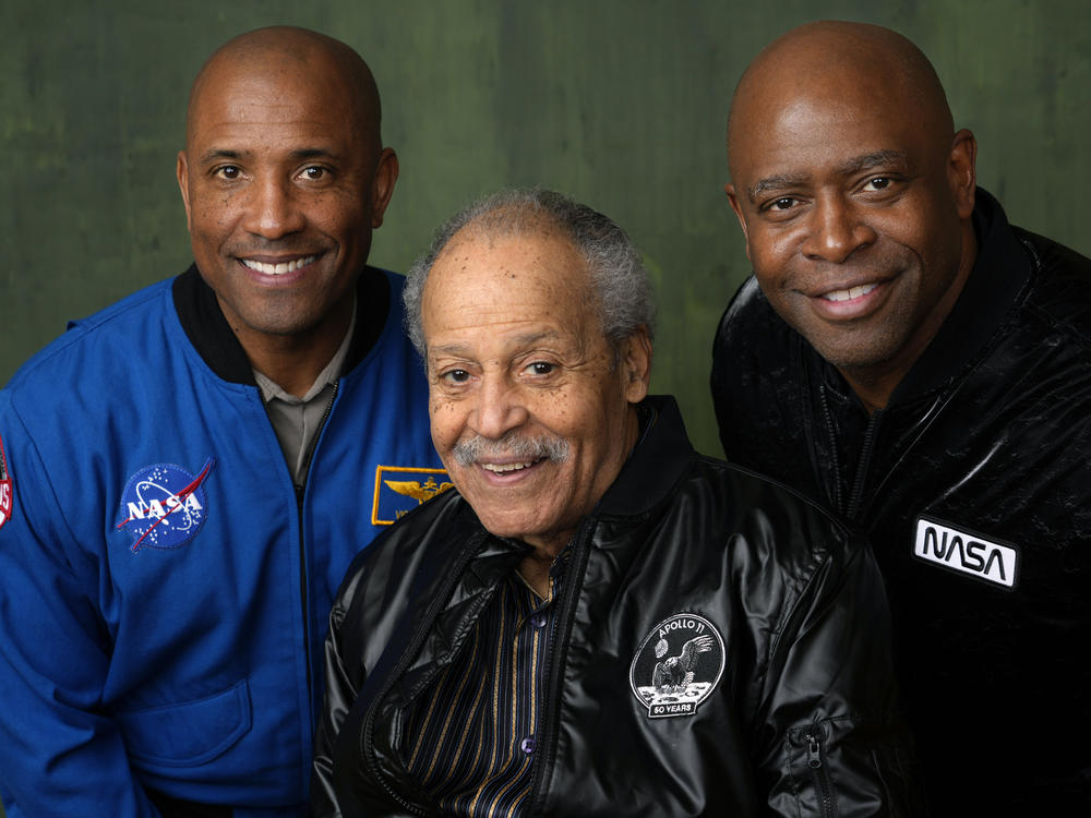 NASA astronauts Victor Glover and Leland Melvin pose with Ed Dwight for a portrait to promote <em>The Space Race</em> in February at The Langham Huntington Hotel in Pasadena, Calif.