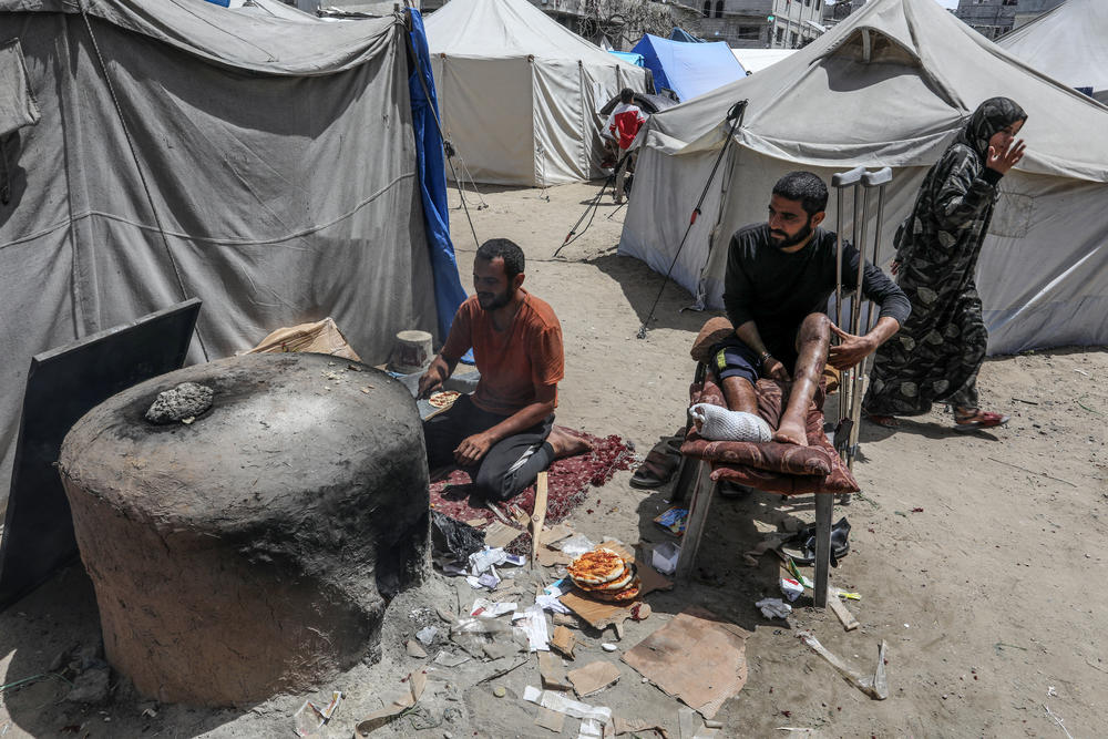 Palestinians in the Gaza Strip who fled Israeli attacks and took refuge in Rafah live in makeshift tents with limited means and under harsh conditions, as seen here on April 22.