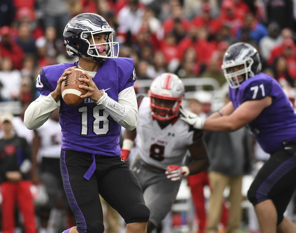 Gonzaga College Eagles quarterback Caleb Williams looks to pass during the WCAC football game between Gonzaga and St. John's College at Paint Branch High School on November 4, 2017.