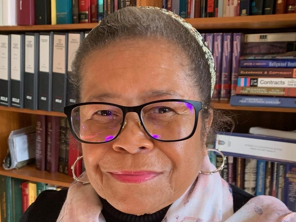Pamela Hill-Veal says that while she and her family were flying first class on Feb. 10 from Chicago to Phoenix, an American Airlines flight attendant stopped her as she returned to her seat and accused her of slamming the restroom door.