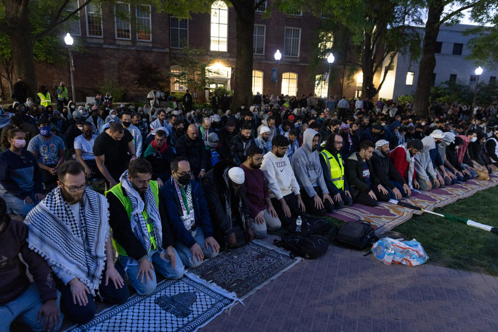 Demonstrators pause for evening prayer during student-led protests and occupation of University Yard of The George Washington University in downtown Washington, D.C. on Thursday.