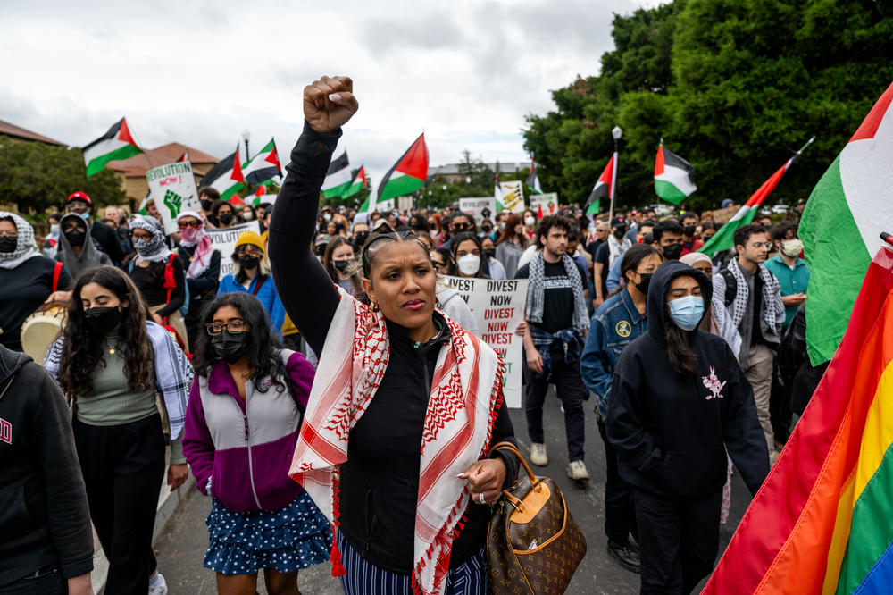 Pro-Palestinian demonstrators march through the Stanford University campus in Stanford, Calif., on April 25, 2024, calling for the university to divest from Israel. The rally took place during Stanford's Admit Weekend, a time for incoming students to tour the university.