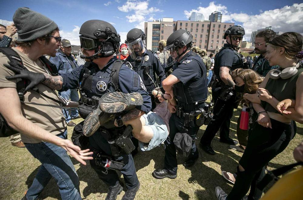 Auraria Police arrest protesters advocating for the end of Israel's offensive in Gaza after they occupied the Tivoli Quad and refused to leave on April 26, 2024.