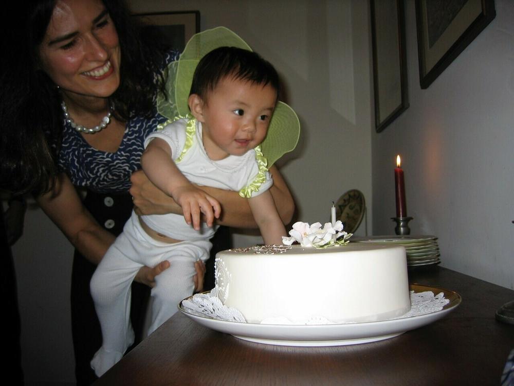 Scott Simon's daughter Elise and his wife, Caroline, on Elise's first birthday.