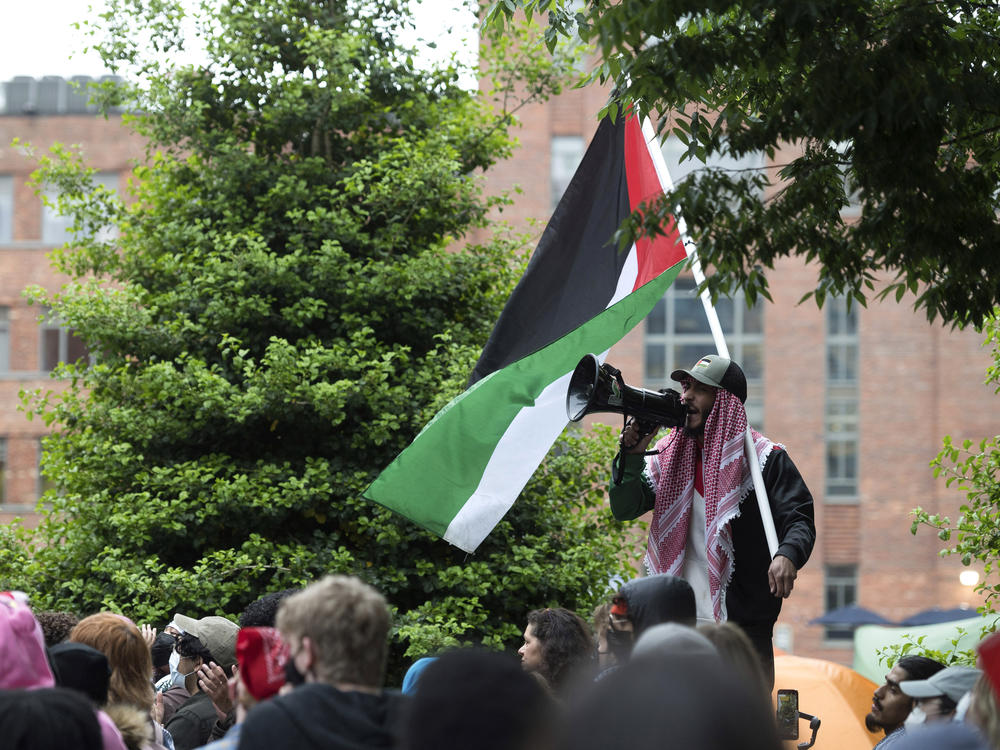 Students protest the Israel-Hamas war at George Washington University in Washington, D.C., on Saturday. Protests and encampments have sprung up on college and university campuses across the country to protest the war.