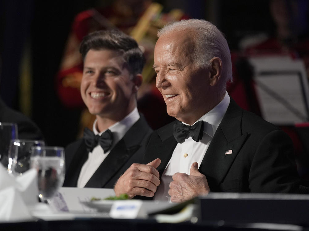 President Joe Biden, right, and host Colin Jost attend the White House Correspondents' Association Dinner at the Washington Hilton, Saturday, April 27, 2024, in Washington.