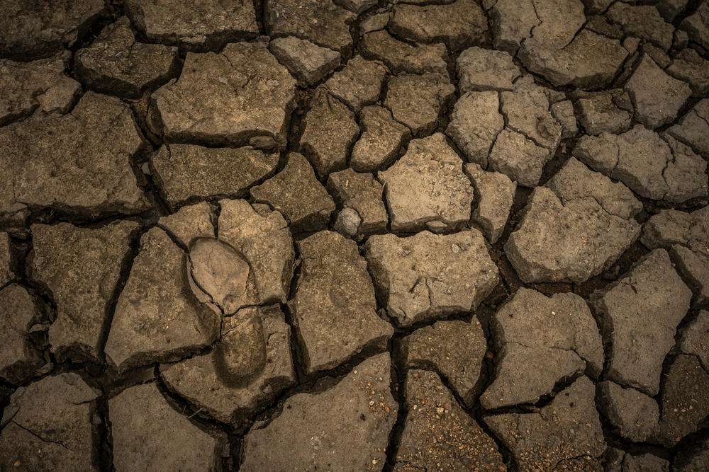 A footprint on a dry section of reservoir at El Guavio Reservoir on April 18, in Gachalá, Colombia. Reservoirs around Colombia are at low water levels due to a major drought caused by El Niño.