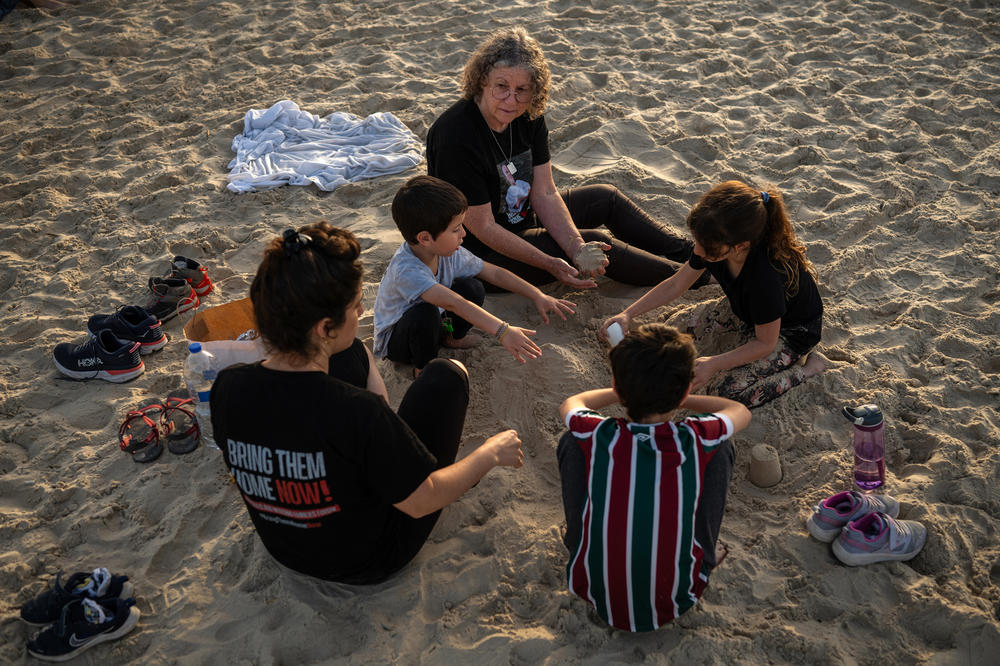 Aviva Siegel spends time with her daughter Elan Tiv, 33, and grandchildren (clockwise from left to right), Hadar, 5, Yali, 8, and Roei, 9, at a beach in Tel Aviv, on March 28.
