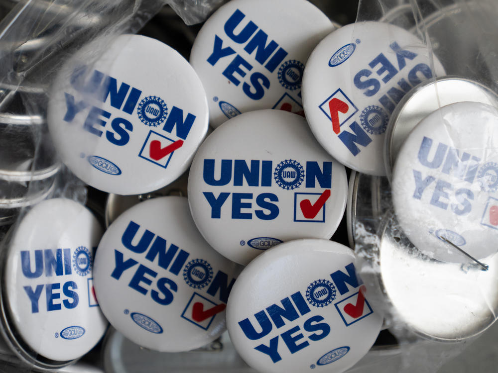 UAW pins that say 
