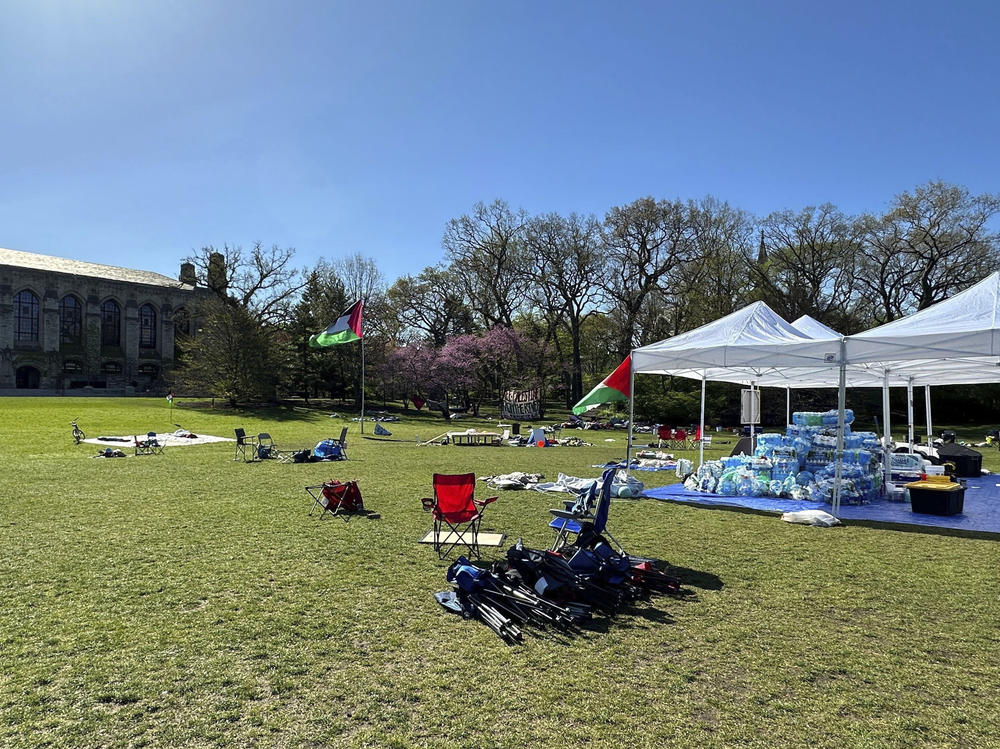 Tents, flags and other supplies remain at Deering Meadow on Northwestern University's campus in Evanston, Ill. on Tuesday a day after the university and protest organizers announced an agreement which largely ended anti-war demonstrations that have lasted days.