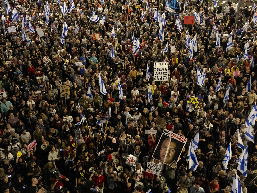 Protesters in Tel Aviv call for Netanyahu to agree to a deal with Hamas in order to free the 133 remaining hostages captive in Gaza, dozens of whom are believed to be dead.