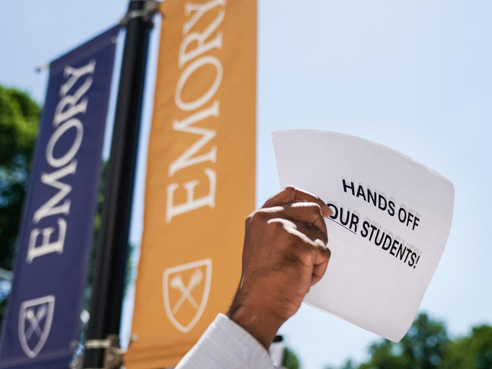 Emory University professors held a walkout on Monday in support of student protesters.